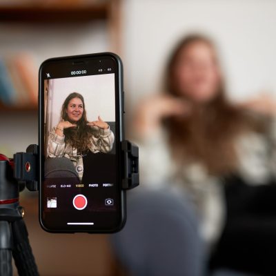 Selective,Focus,On,Smartphone,Screen,Recording,Plus,Size,Blogger,Influencer